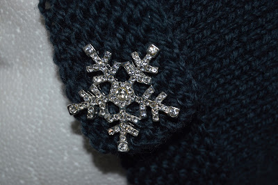 snowflake button on hand knit hat available for sale