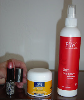 Beauty Without Cruelty Products lipstick, moisturizer and hairspray.jpeg