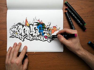 Creator Writing Graffiti Alphabets on Book 