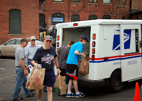 volunteers unloading the truck