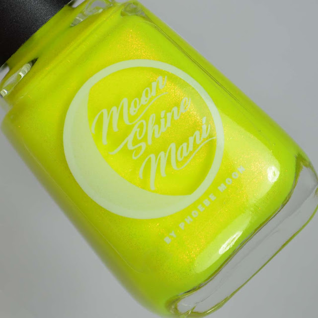 neon yellow nail polish with shimmer in a bottle