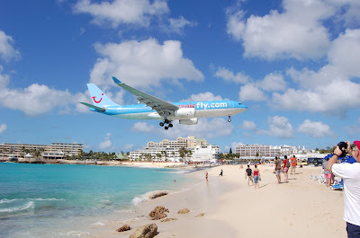 The airport where the runway is by a beach