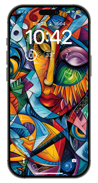 A vibrant abstract mural with a human face, composed of vivid colors and geometric shapes.