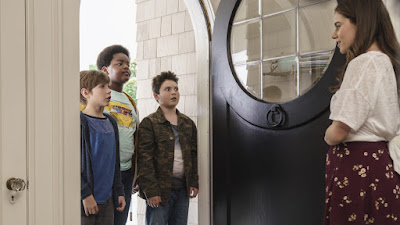 Molly Gordon opens the door for Jacob Tremblay, Keith L. Williams, and Brady Noon in a movie still for Point GreyPictures's film Good Boys