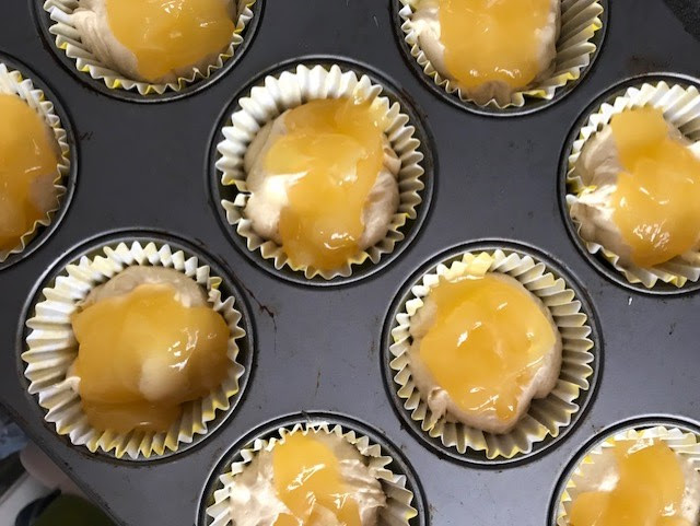 lemon curd spooned into mixture