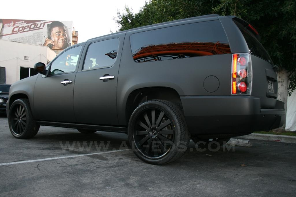 Cedric The Entertainer matte black GMC Denali on 24 Santorini