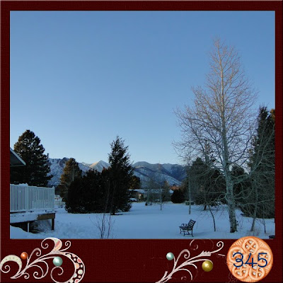 View towards The Peaks, there is snow covering the yard.