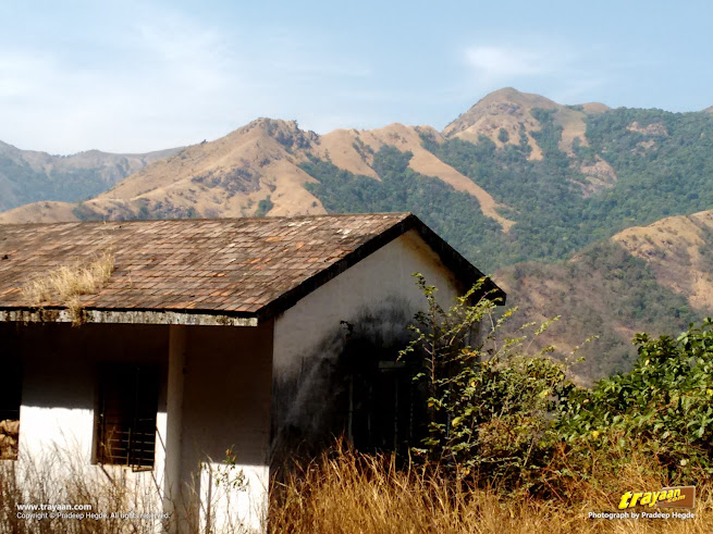 A building and Western Ghats in background