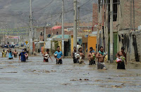 Flooding in Peru has left tens of thousands of people homeless, following the global trend of extreme weather made more likely by climate change. (Credit: Getty Images) Click to Enlarge.