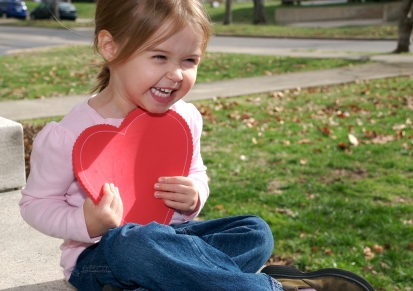 why celebrate valentine's day NAMC montessori classroom student with heart