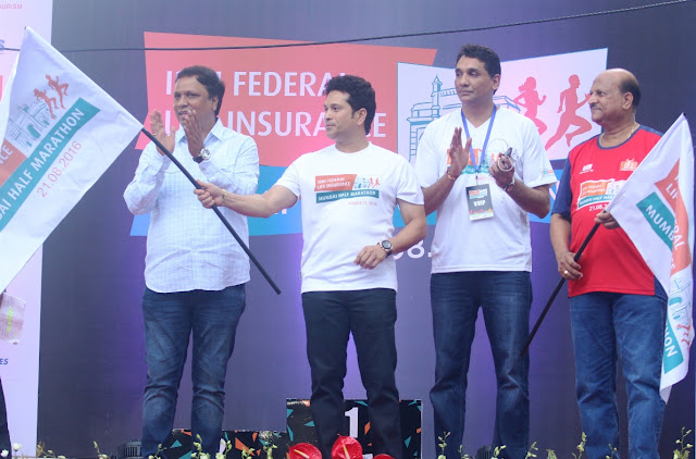 Pic 2: (L-R) Ashish Shelar, MLA & President, Bharatiya Janata Party,Sachin Tendulkar, Face of the Marathon,Vighnesh Shahane, CEO, IDBI Federal Life Insurance and Kishor Kharat, MD & CEO, IDBI Bank flagging off the Inaugural IDBI Federal Life Insurance Mumbai Half Marathon.