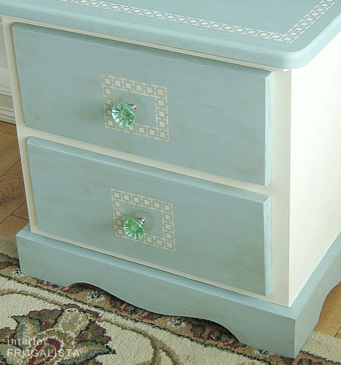 A painted pine bedside table makeover with aged patina using brown antiquing wax.