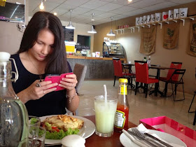 Shea taking pics in Coffee O'Clock