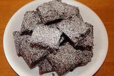 Top view of Mexican brownies dusted with powdered sugar.