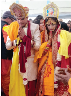 The bride and groom with the crown