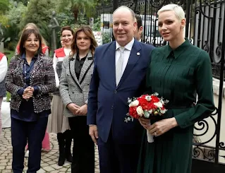 Prince Albert and Princess Charlene of Monaco handed out gifts