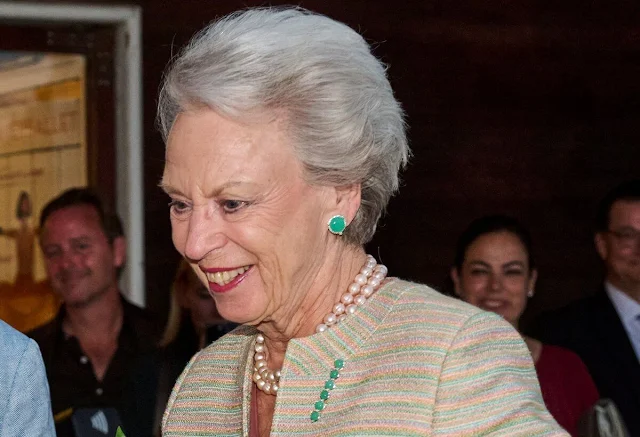 Princess Benedikte wore a beige tweed jacket and dry rose skirt. Chanel pumps. Green earrings and brooch