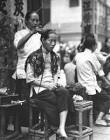 Peluquería callejera Hong Kong 1920