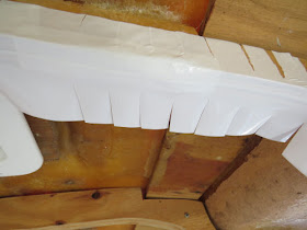 white tape used as trim inside a trailer