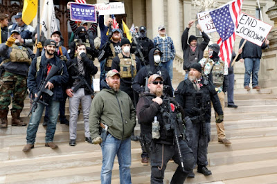 Photo of armed white supremacists terrorists occupying Michigan's state house in a pro-coronavirus demonstration.