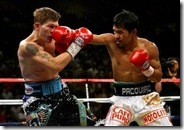 3929386863-pacquiao-knocks-out-hatton-for-historic-triumph