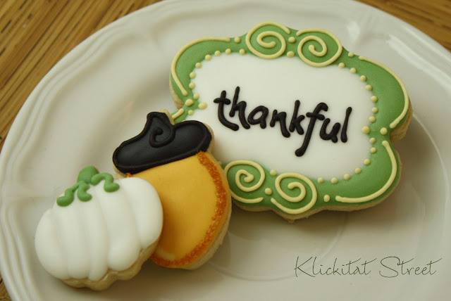 a fancy plaque cookie cut with a skull cookie cutter