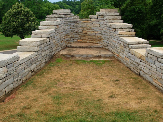 Giant Chief's Head Busts Out of Wall