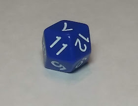A blue d12 manufactured in such a way as to have each face shaped like a diamond rather than a pentagon.