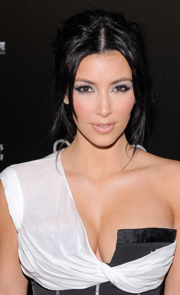 Kim Kardashian looks like a Grecian Goddess warrior in this white and black