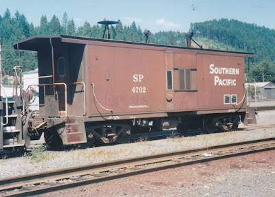 Southern Pacific C-50-9 Caboose #4702 in Oakridge, Oregon, on July 18, 1997