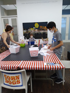 Family enjoying the Family Activity Center at the Figge Museum