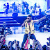 Security Guard Throws Fan Off Stage While Trying To Touch Wizkid (Watch Video)