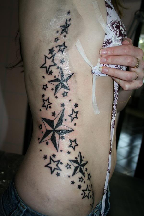 shooting star tattoo designs. stars tattoos designs.