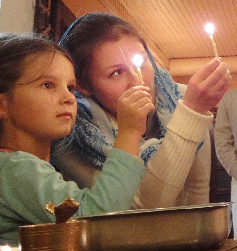 Devotees Devotedly Offer Lamps to the Lord