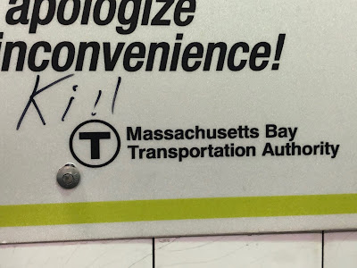 Kill! written over the T symbol, Massachusetts Bay Transportation Authority written beside it