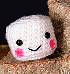 http://www.ravelry.com/patterns/library/campfire-the-mini-marshmallow-amigurumi