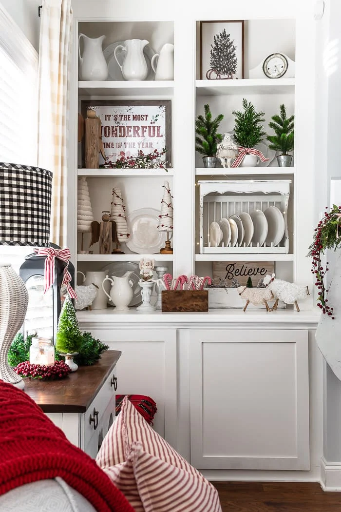 built in bookshelves with ironstone, Christmas trees