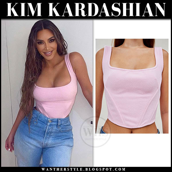 Kim Kardsahian in pink corset top and jeans