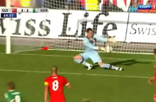 Switzerland goalkeeper Diego Benaglio fails to save a shots from Germany forward André Schürrle