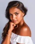 Sri Lankan girl, off shoulder white top, portrait shot, AI generated image, thumbnail image