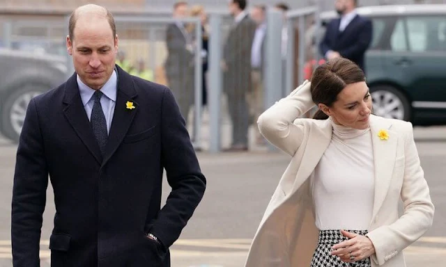 Princess of Wales wore a houndstooth tweed midi skirt by Zara. Alexander McQueen cashmere coat