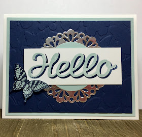 This navy and sky card uses Stampin' Up!'s Papillon Potpourri and Vertical Garden stamp sets.  We also used the Elegant Butterfly Punch, Fluttering embossing folder, and Metallic Foil Doilies.  #stampinup #stamptherapist www.stampwithjennifer.blogspot.com