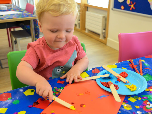 A toddler enjoying crafts at Wakefield Museum