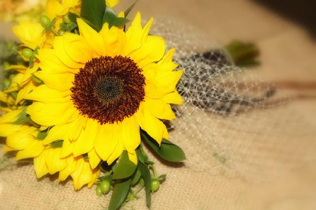 We used quite a bit of burlap for her DIY wedding Here sunflowers and lace 