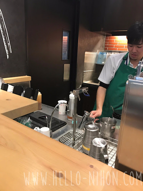 Starbucks worker making my drink
