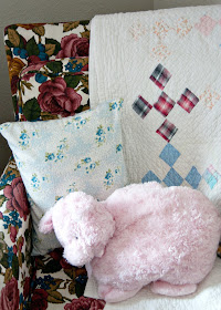 Granny chic chair, vintage baby quilt and stuffed pig
