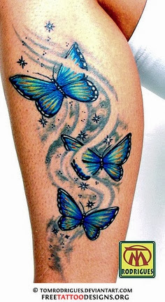 Tribal butterfly tattoo on leg