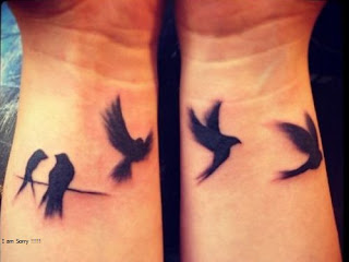 hand couple tattoo