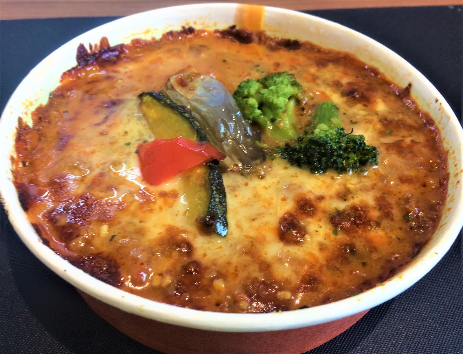 実食 トマらない旨味トマトの夏カレードリア セブン レビュー カロリー糖質は コンビニ研究本部新ジャンル調査室 コンビニ サラリーマン総研 最新コンビニグルメがわかるブログ 実食 トマらない旨味トマトの夏カレードリア セブン レビュー カロリー糖質は コンビニ研究本部新ジャンル調査室 コンビニ サラリーマン総研 最新コンビニグルメがわかるブログ