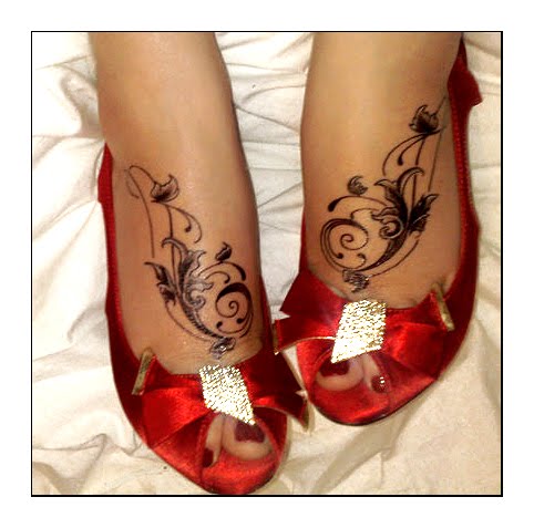 tattoo models. flower on foot tattoo models :